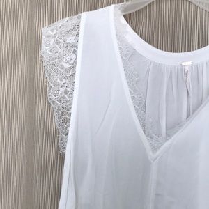 White flowy Free People tank